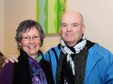 Artists Barbara Brown and Dan Sharp, seen in front of Sharp's "Green Ogee" acrylic on canvas, at the vernissage for Cube Gallery's 10th anniversary exhibition, held Sunday, January 11, 2015.