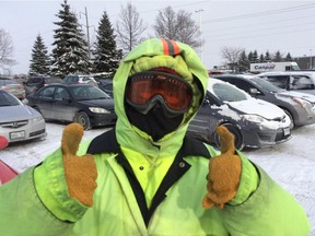 Brad Fleming dressed for the weather Wednesday for his job monitoring parking at 100 Constellation Dr. "What do you expect?" Fleming said. "It's January."