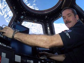 Canadian astronaut Chris Hadfield poses for a photo in this undated handout photo. Hadfield is one of nine Canadiens to travel to space.