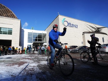 City councillor Mathieu Fleury departs City Hall as he takes part in the 4th Annual Family Winter Cycling Parade, celebrating winter cycling on Sunday, January 25, 2015.  (Cole Burston/Ottawa Citizen)