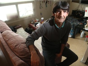 Dale Stiles, photographed in the downtown Ottawa apartment that he shares with his girlfriend, says he'll have difficulty paying the victim surcharge.