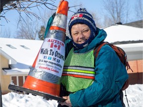 Dee Gordon, mother of three, seen here on HWY 16 near North Gower, is walking to Ottawa from Toronto to raise awareness about the struggles of autism and the much-needed funding to help Canadian families cope. Assignment - 119672 Photo taken at 12:14 on January 28. (Wayne Cuddington/Ottawa Citizen)