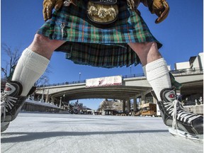 No peeking. Don Cummer skates on the Rideau Canal Skateway in a kilt.