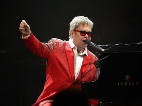 NEW YORK, NY - DECEMBER 31:  Musician Elton John performs at the Barclays Center on December 31, 2014 in the Brooklyn borough of New York City. This was the first time he has performed in New York City on a New Year's Eve.