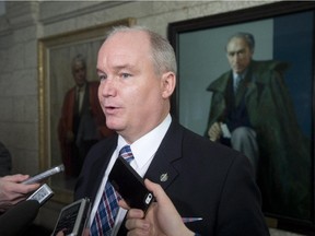 Veterans Affairs Minister Erin O'Toole speaks with the media following caucus meetings on Parliament Hill in Ottawa, Wednesday January 28, 2015. THE CANADIAN PRESS/Adrian Wyld