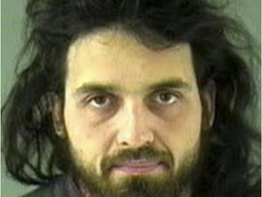 FILE - This undated file image provided by the Royal Canadian Mounted Police shows Michael Zehaf-Bibeau, 32, who shot a soldier to death at Canada's national war memorial day on Wednesday, Oct. 22, 2014. Radical Muslim Michael Zehaf-Bibeau killed a soldier outside Canada's parliament. Right-wing extremist Larry McQuilliams opened fire on buildings in Texas' capital and tried to burn down the Mexican Consulate. Al-Qaida-inspired Michael Adebowale and an accomplice hacked an off-duty soldier to death in London. Police said the three perpetrators of recent attacks were terrorists and motivated by ideology. Authorities and family members said they may have been mentally ill. (AP Photo/Vancouver Police via The Royal Canadian Mounted Police, File)   // na1217 MacKay ISIL