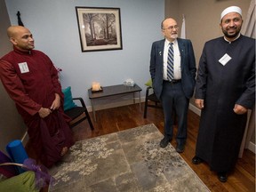 Buddhist monk Bhante Jinananda, left, Rabbi Reuven Bulka and Imam Samy Metwally look over the space as the Ottawa Regional Cancer Foundation officially opened the new Multi-Faith & Meditation Suite in the Healing Corner at the Maplesoft Centre.