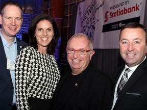 From left, event co-chair Jason Trottier with YSB Charitable Foundation executive director Janice Barresi, event co-chair Patrice S. Basille and Frank Bilodeau from presenting sponsor Scotiabank at the Ottawa Gatineau Hotel Association's Dine Wine Wintertime, held Thursday, January 29, 2015, at Ottawa City Hall.
