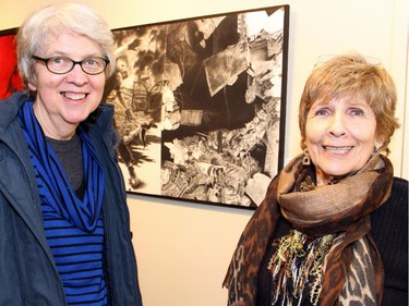From left, visual artists Petra Halkes and Jerry Grey dropped into the vernissage for Cube Gallery's 10th anniversary exhibition, held Sunday, January 11, 2015.