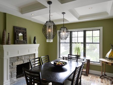 At the front of the home, the dining room was once the living room and features the same stone that’s found on the exterior.