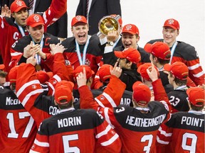 Robby Fabri #29 of Canada hoists the cup after a 5-4 win over Russia during the Gold medal game of the 2015 IIHF World Junior Championship on January 05, 2015 at the Air Canada Centre in Toronto, Ontario, Canada.
