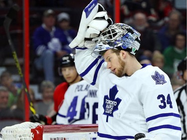 James Reimer of the Toronto Maple Leafs shows his dejection after being scored on by the Ottawa Senators during first period NHL action.