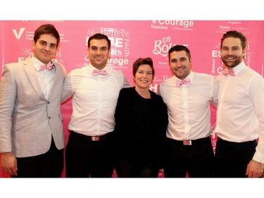 Jennifer Graves, corporate and community development manager with the Ottawa Regional Cancer Foundation, surrounded herself with these handsome volunteers, Jean Turpin, Michael Laurysen, Corey Laurysen and Nigel Newland at the Revive Your Style fundraiser held Sunday, January 25, 2015, at the Sala San Marco banquet hall