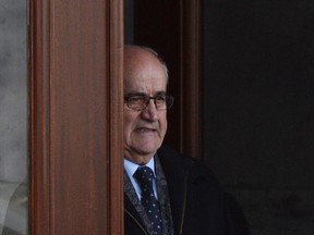 Newly-appointed Associate Minister of National Defence Julian Fantino leaves Rideau Hall in Ottawa on Monday, January 5, 2015.