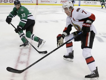 Ottawa Senators centre Kyle Turris (7) skates for the puck against Dallas Stars defenceman Alex Goligoski (33) during the first period.