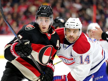 Kyle Turris goes head to head with Tomas Plekanec, right, in the second period.