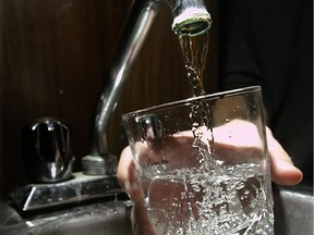 Local Input~ Windsor,Ont. Nov.2/04-Glass of water for illustration on safe drinking water.(Windsor Star-Tim Fraser); tap ; faucet