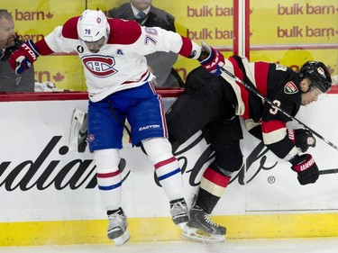 Montreal Canadiens defenceman P.K. Subban collides with Ottawa Senators defenceman Marc Methot along the boards during second periond NHL action.