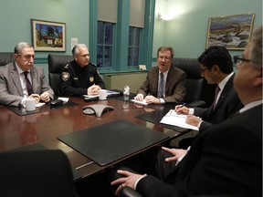 Mayor Jim Watson meets with Ottawa Police Chief Charles Bordeleau, Ottawa Centre MPP Yasir Naqvi, Coun. Eli El-Chantiry – who chairs the police services board – and others on Monday evening,  Jan. 12, 2015.