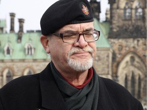 Michael Blais, President, Canadian Veterans Advocacy, during a small rally on Parliament Hill for veterans and mental health, in Ottawa on November 08, 2014. (Jana Chytilova / Ottawa Citizen)  ORG XMIT: 1109 Rally on Hill 01