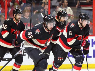 Mika Zibanejad (93), Bobby Ryan (6), Clarke MacArthur (16) and Cody Ceci (2nd from R) of the Ottawa Senators celebrate Zibanejad's goal against the Dallas Stars during first period NHL action.