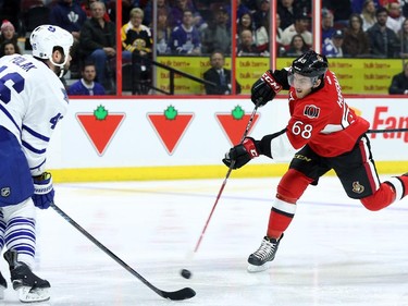 Mike Hoffman of the Ottawa Senators scores on James Reimer of the Toronto Maple Leafs during first period NHL action.