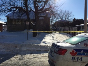 Police tape around a home on Morriset Avenue as part of their investigation of an early morning shooting incident.