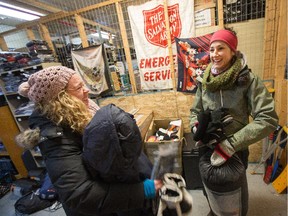 Nicole Giroux (L) and Carley McKenna, (seen here at their lock-up) are Street Outreach workers from the Salvation Army who travel the streets of Ottawa responding to calls for assistance from homeless and other "at risk" persons needing food and clothing, especially on very cold days.