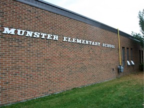 Ottawa-10/20/08-L2R Munster Elementary School was closed today due to a fire that was discovered at about 6:45am, by the custodian of the school, on Oct. 20, 2008, in Ottawa. Firefighters are keeping doors and windows open to vent he smoke from the school. Photo by JANA CHYTILOVA, THE OTTAWA CITIZEN (For CITY section) ASSIGNMENT NUMBER 92097