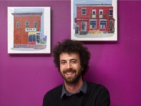 Ottawa artist Colin White with two pieces from his series Confectionaries.