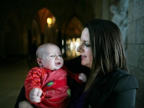 NDP MP Sana Hassainia poses for a photograph with her then-three-month-old baby Skander-Jack Kochlef on Parliament Hill in 2012. Hassainia said she was asked to to remove her baby from the House of Commons before a vote.