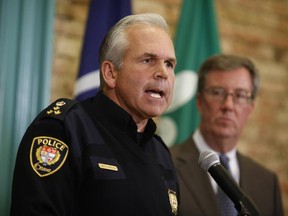 Ottawa police Chief Charles Bordeleau speaks at a press conference with Mayor Jim Watson. Neither is in support of safe-injection sites. (David Kawai / Ottawa Citizen)