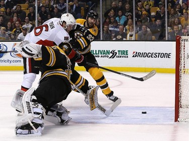 BOSTON, MA - JANUARY 3:  Bobby Ryan #6 of the Ottawa Senators scores by Tuukka Rask #40 of the Boston Bruins in overtime for the win at TD Garden on January 3, 2015 in Boston, Massachusetts.