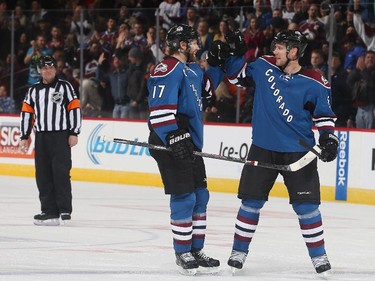 DENVER, CO - JANUARY 08: Brad Stuart #17 celebrates his first goal as a member of the Colorado Avalanche with teammate Jan Hejda #8 against the Ottawa Senators at the Pepsi Center on January 8, 2015 in Denver, Colorado.
