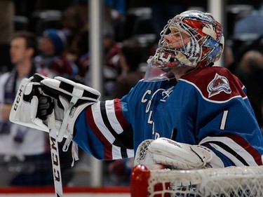 Goalie Semyon Varlamov #1 of the Colorado Avalanche warms up as he prepares to defend the goal against the Ottawa Senators.