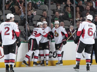 Jared Cowen #2, Mike Zibanejad #93, Mike Hoffman #68, Cody Ceci #5 and Bobby Ryan #6 of the Ottawa Senators celebrate a goal against the Dallas Stars at the American Airlines Center on January 13, 2015 in Dallas, Texas.