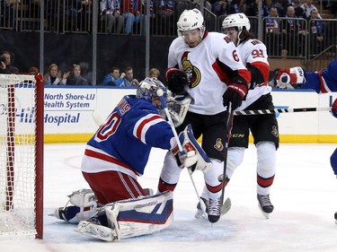 Henrik Lundqvist #30 of the New York Rangers tends goal against Bobby Ryan #6 of the Ottawa Senators.