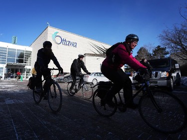 People depart City Hall as they take part in the 4th Annual Family Winter Cycling Parade, celebrating winter cycling on Sunday, January 25, 2015.  (Cole Burston/Ottawa Citizen)