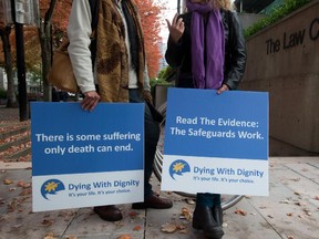 Assisted-suicide supporters wait outside the B.C. Court of Appeal before the court overturned a lower court ruling that said Canada's assisted-suicide ban violated the charter rights of gravely ill Canadians, in Vancouver, B.C., on Thursday October 10, 2013.