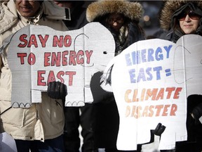 Protesters represented by The Council of Canadians, Ecology Ottawa, 350 Ottawa, Greenpeace Ottawa, and the Raging Grannies voiced their concerns outside of a Premiers conference at the Delta Hotel in Ottawa.