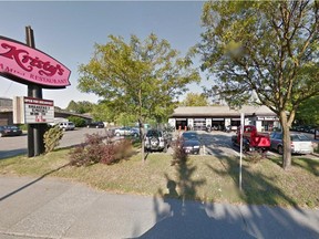 Richmond Road business owners Kristy's Family Restaurant and Dave Rennie's garage fear that their properties could be expropriated as part of light rail construction, but say the city is keeping them in the dark. (screen capture/Google Street View)