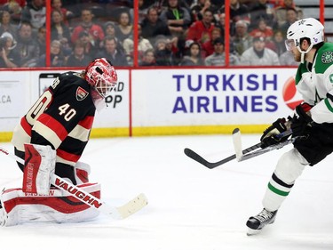 Robin Lehner of the Ottawa Senators can't make the save but is not scored on by Tyler Seguin of the Dallas Stars during second period NHL action.
