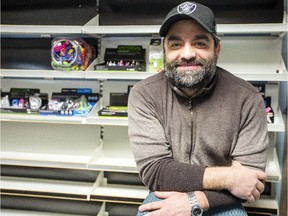 Rod Castro, Carleton University Student's Association business operations manager is photographed at Henry's Convenience Store on campus, Tuesday January 6, 2015, where cigarettes are no longer sold.