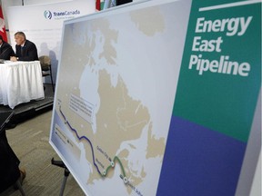 TransCanada CEO Russ Girling, right, and TransCanada president of energy and oil pipelines Alex Pourbaix announce the company is moving forward with the 1.1 million barrel-per-day Energy East Pipeline.