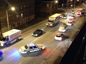 Emergency vehicles block Bronson Avenue late Friday afternoon after reports of a gunman nearby. The road was cleared by 6 p.m., and police are investigating whether the report was a false one.