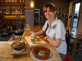 Soca Kitchen and Pub chef Daniela Manrique prepares the following dishes: Dirty Rice, Hamachi Tiradito, and Simple Chicken.  Assignment - 119568 Photo taken at 15:24 on January 16. (Wayne Cuddington/Ottawa Citizen)