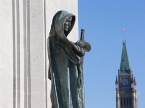 Spec of Supreme Court Building statues. This one being Justitia (Justice). Assignment - 119182 Photo taken at 10:32 on December 5. (Wayne Cuddington/ Ottawa Citizen)