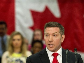 Former NHL player and victim to sexual abuse Sheldon Kennedy speaks after Prime Minister Stephen Harper announced the induction of legislation to create a Canadian Victims Bill of Rights in Toronto on April 3, 2014. Sheldon Kennedy says being the recipient of one of the country's top honours can serve as a beacon to lead countless other children out of the darkness of child abuse.