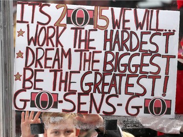 A young fan holds up a sign of support to start the New Year for the Ottawa Senators prior to a game against the Tampa Bay Lightning at Canadian Tire Centre on January 4, 2015 in Ottawa, Ontario, Canada.