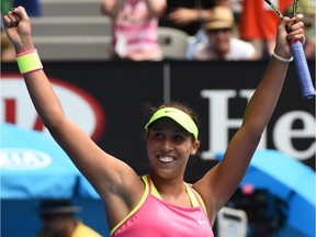 Madison Keys of the US celebrates winning her women's singles match against Venus Williams of the US on day ten of the 2015 Australian Open tennis tournament in Melbourne on January 28, 2015.